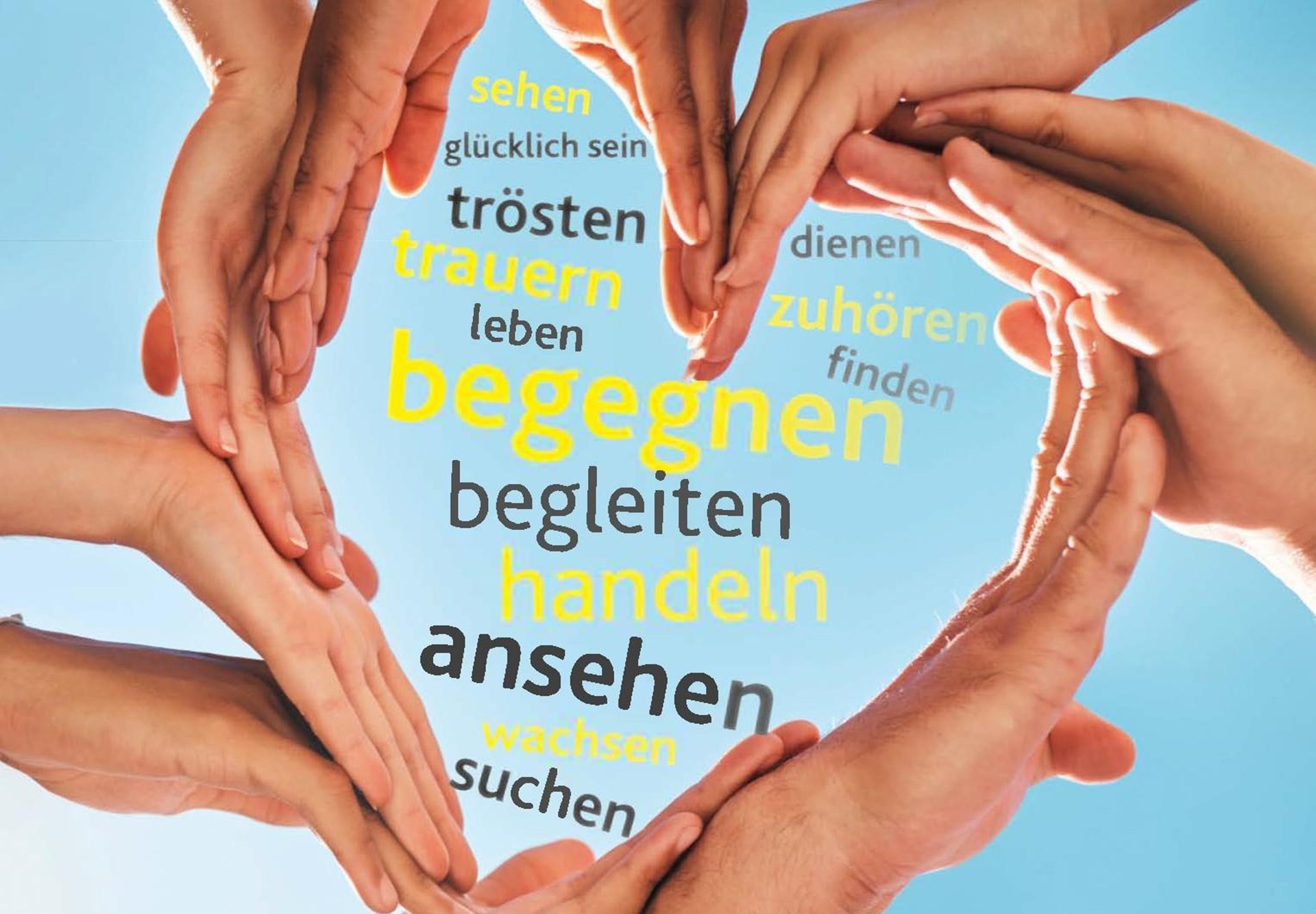 Hände bilden eine Herzform, umgeben von deutschen Worten, die Liebe und Zusammenhalt ausdrücken.